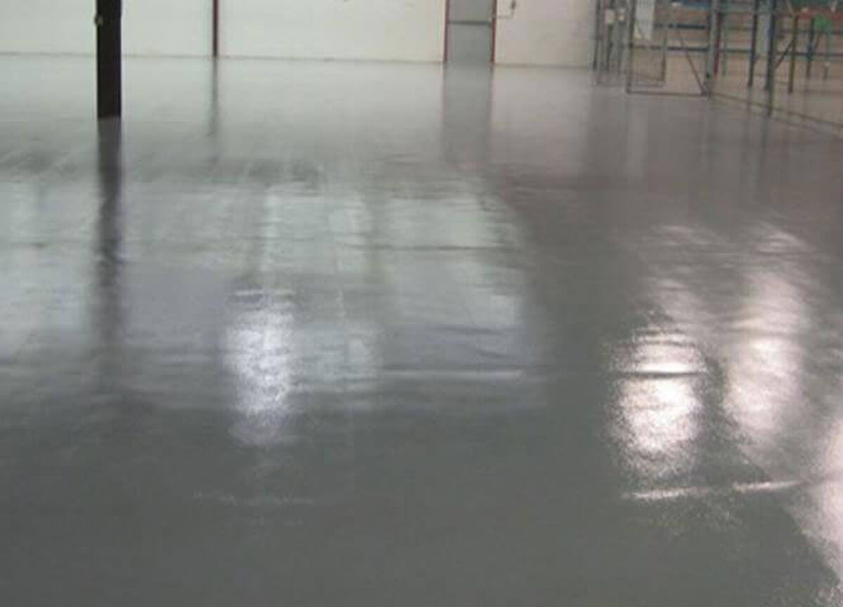 Moisture mitigation service on an industrial floor Moisture Mitigation: How Kaloutas Teams Prevent Concrete Floor Damage